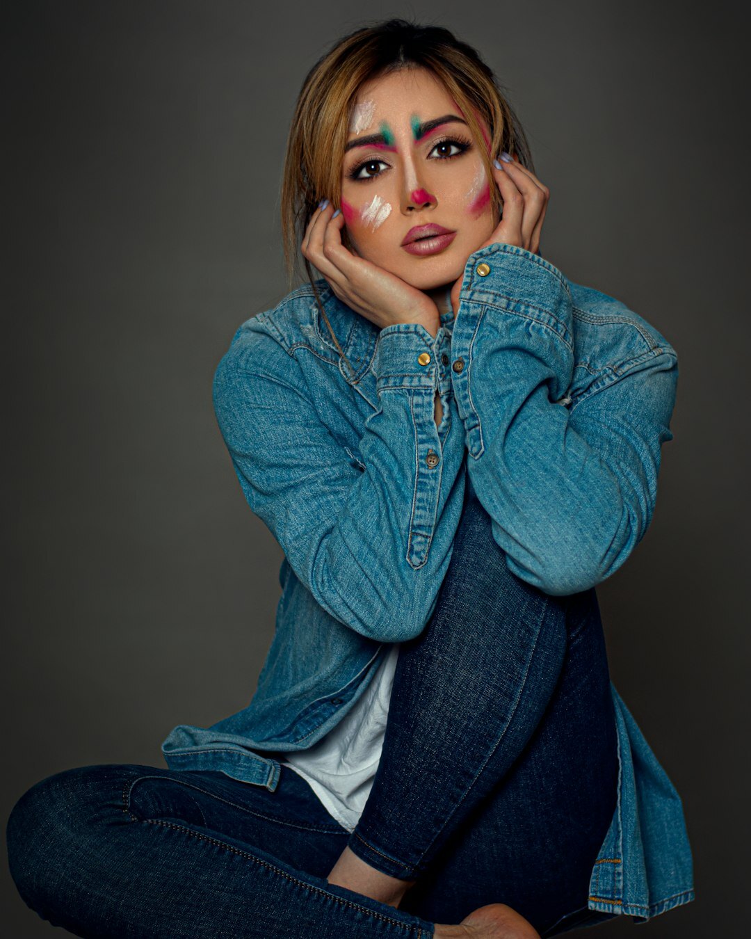 Studio portrait of a Turkish woman in her thirties wearing a blazer