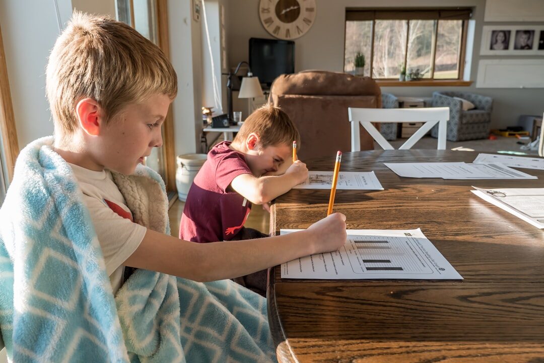 Turkish family of three generations sitting together at home reviewing paperwork